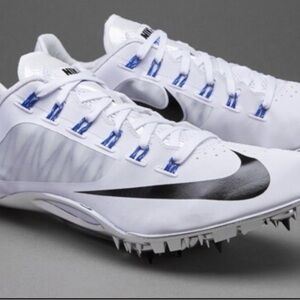 Nike fly wire White Track Spikes with Black Swoosh and Blue Accents